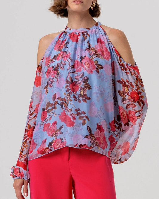 Blusa floreale azzurra con spalle scoperte