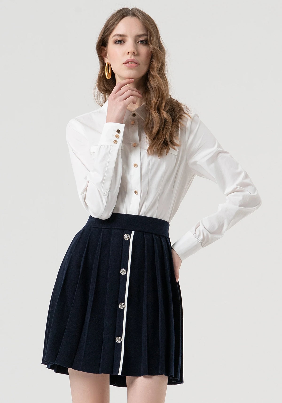 Gonna flare mini in maglia plissettata