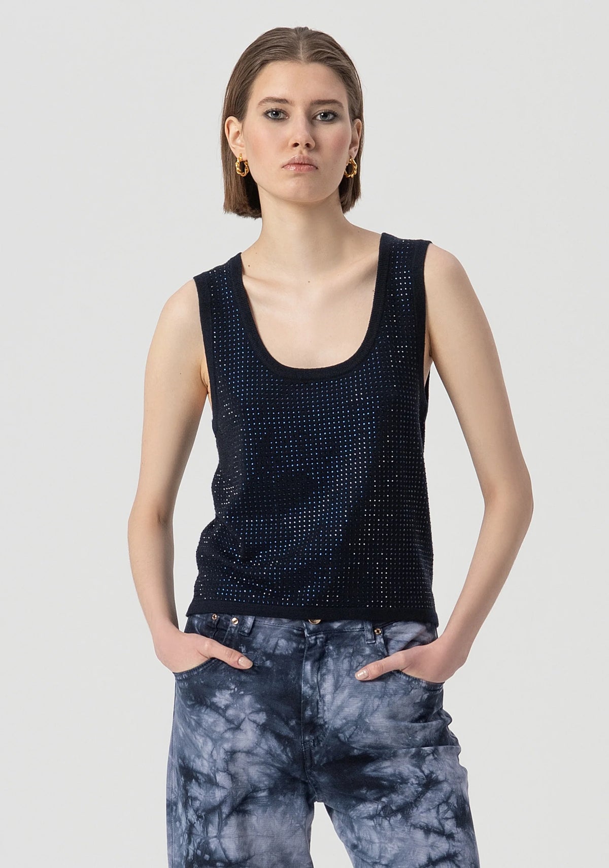 Top in maglia senza maniche con strass