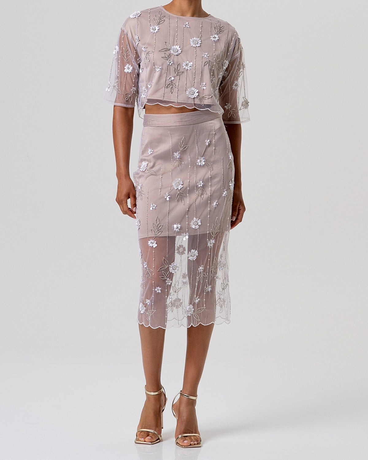 Gonna in tulle ricamato con trasparenze midi